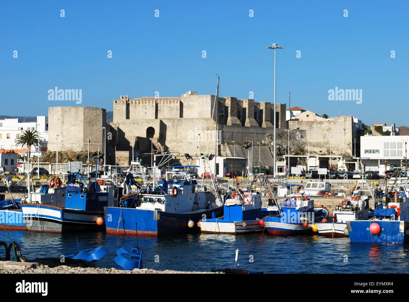 Castle Guzman el Bueno with fishing harbour in the foreground, Tarifa, Costa de la Luz; Cadiz Province, Andalusia, Spain. Stock Photo