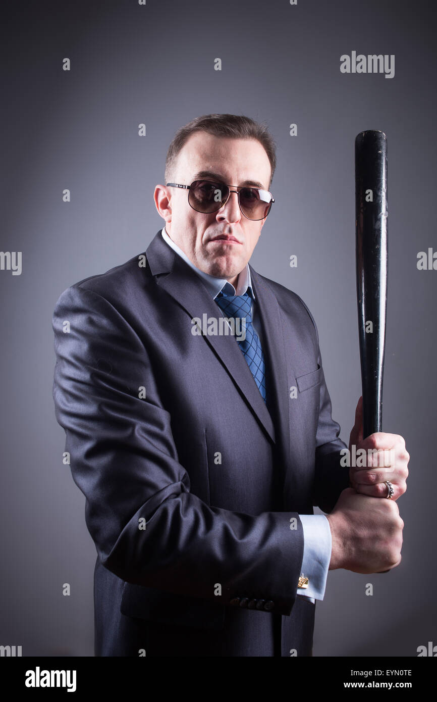 male gangster with baseball bat Stock Photo - Alamy