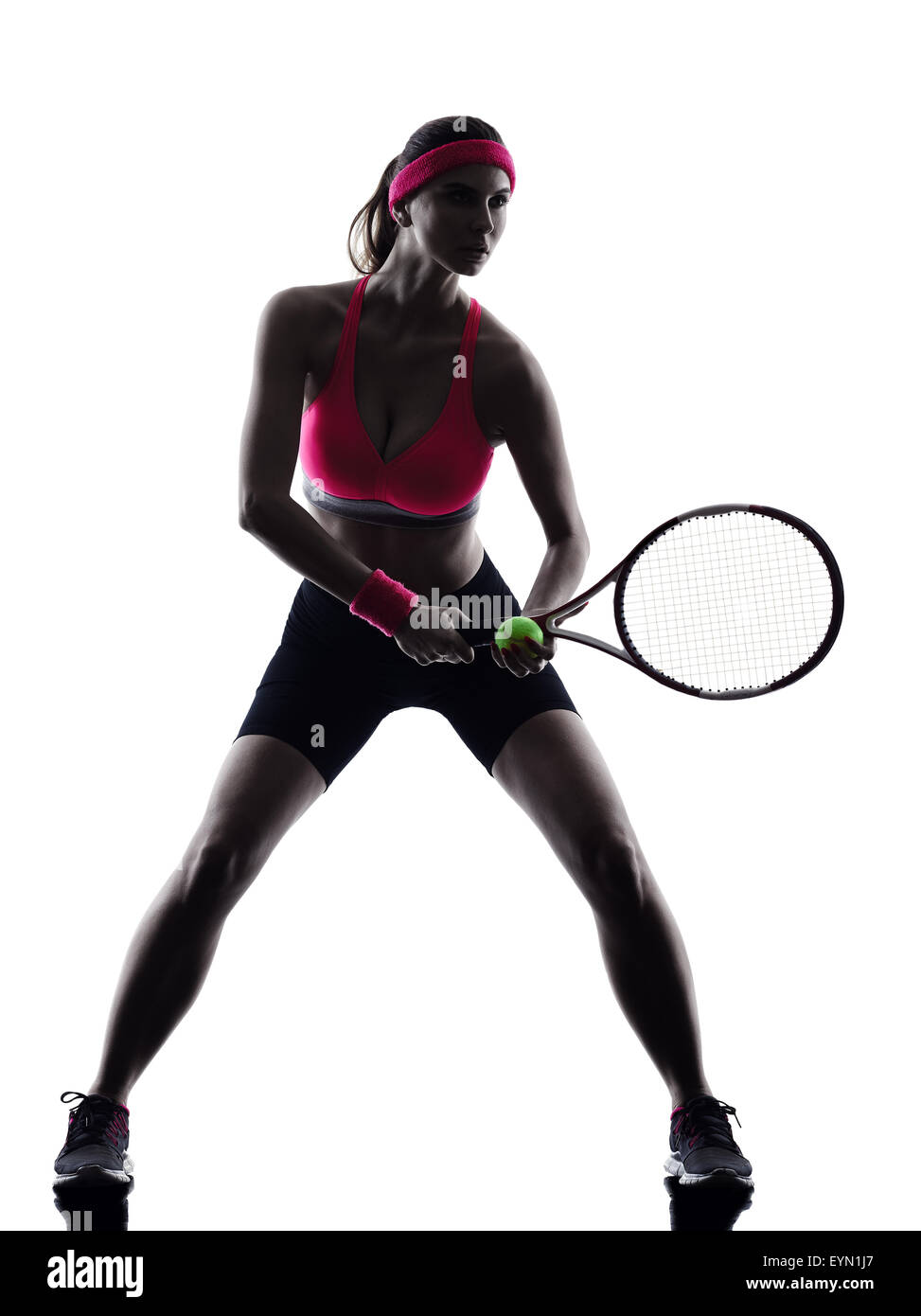 one woman tennis player  in studio silhouette isolated on white background Stock Photo
