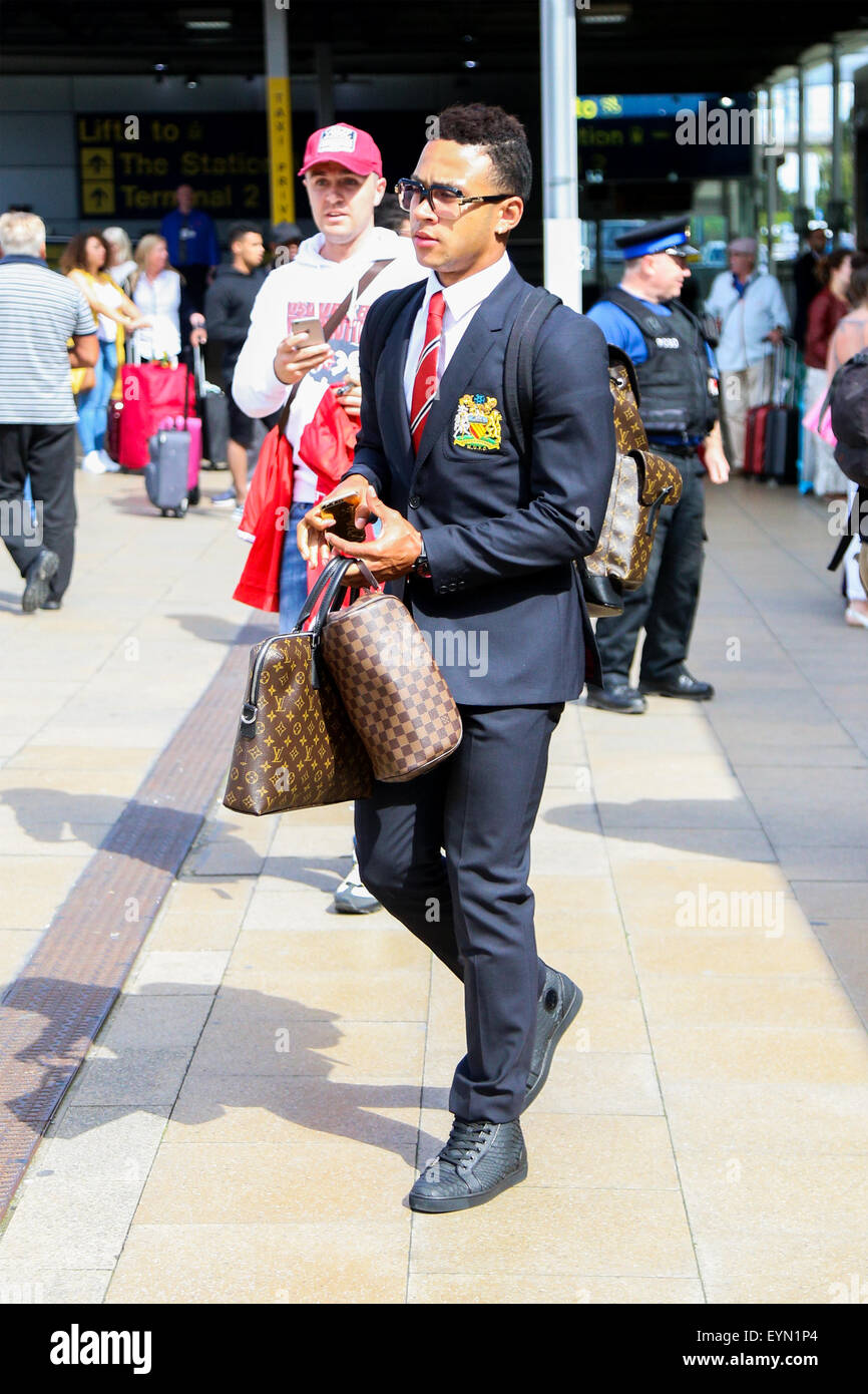 Memphis Depay arrives with the Manchester United squad after their pre-season tour of the United States. Stock Photo