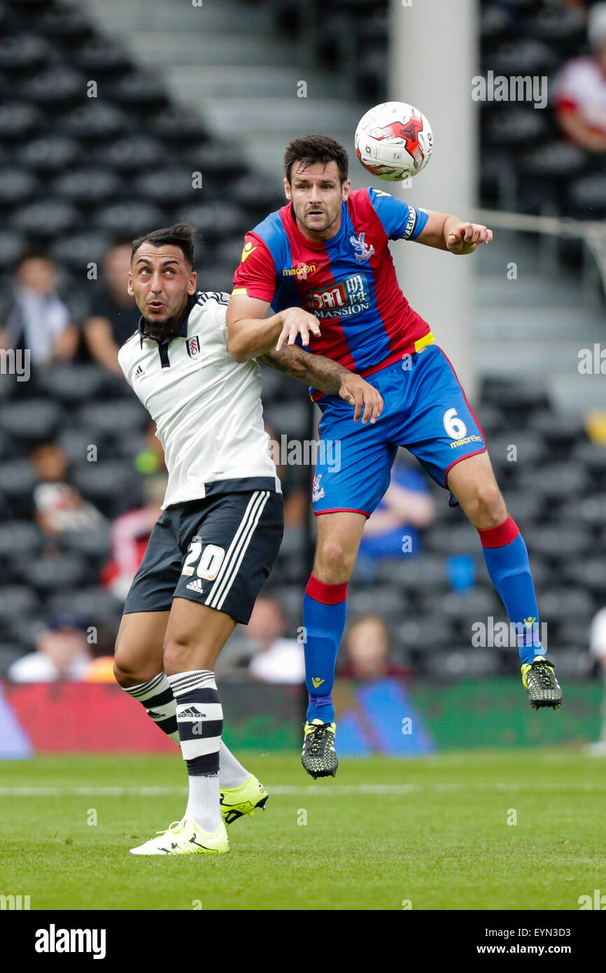 London, UK. 01st Aug, 2015. Pre Season Friendly. Fulham versus Crystal Palace. Crystal Palace's Scott Dann in an aerial challenge with Fulham's Kostas Mitroglou Credit:  Action Plus Sports/Alamy Live News Stock Photo