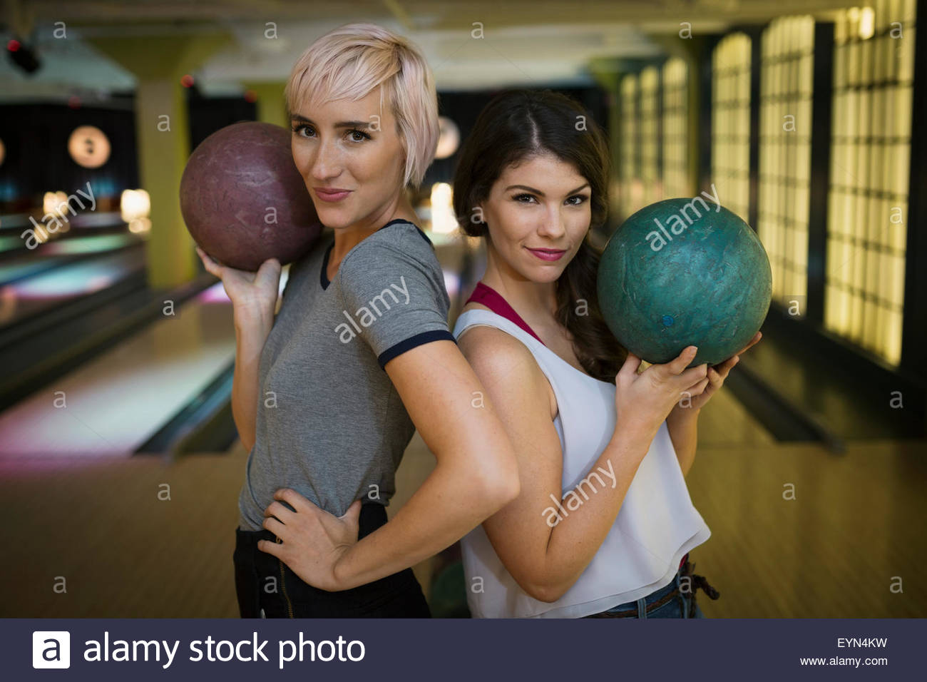 Two women holding bowling balls hires stock photography and images Alamy