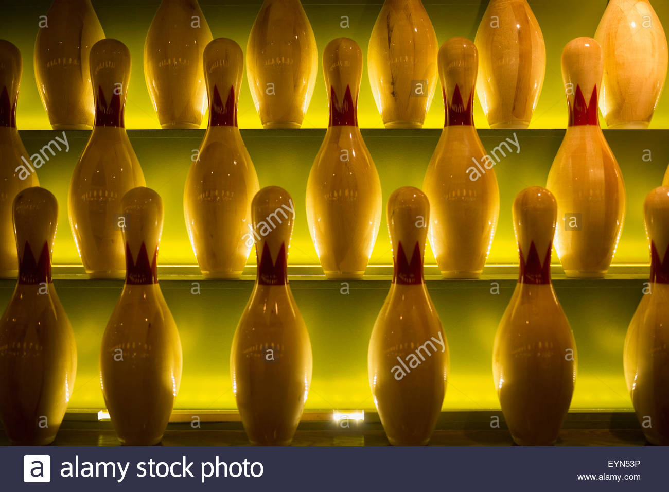 Glowing bowling pins on shelves Stock Photo Alamy