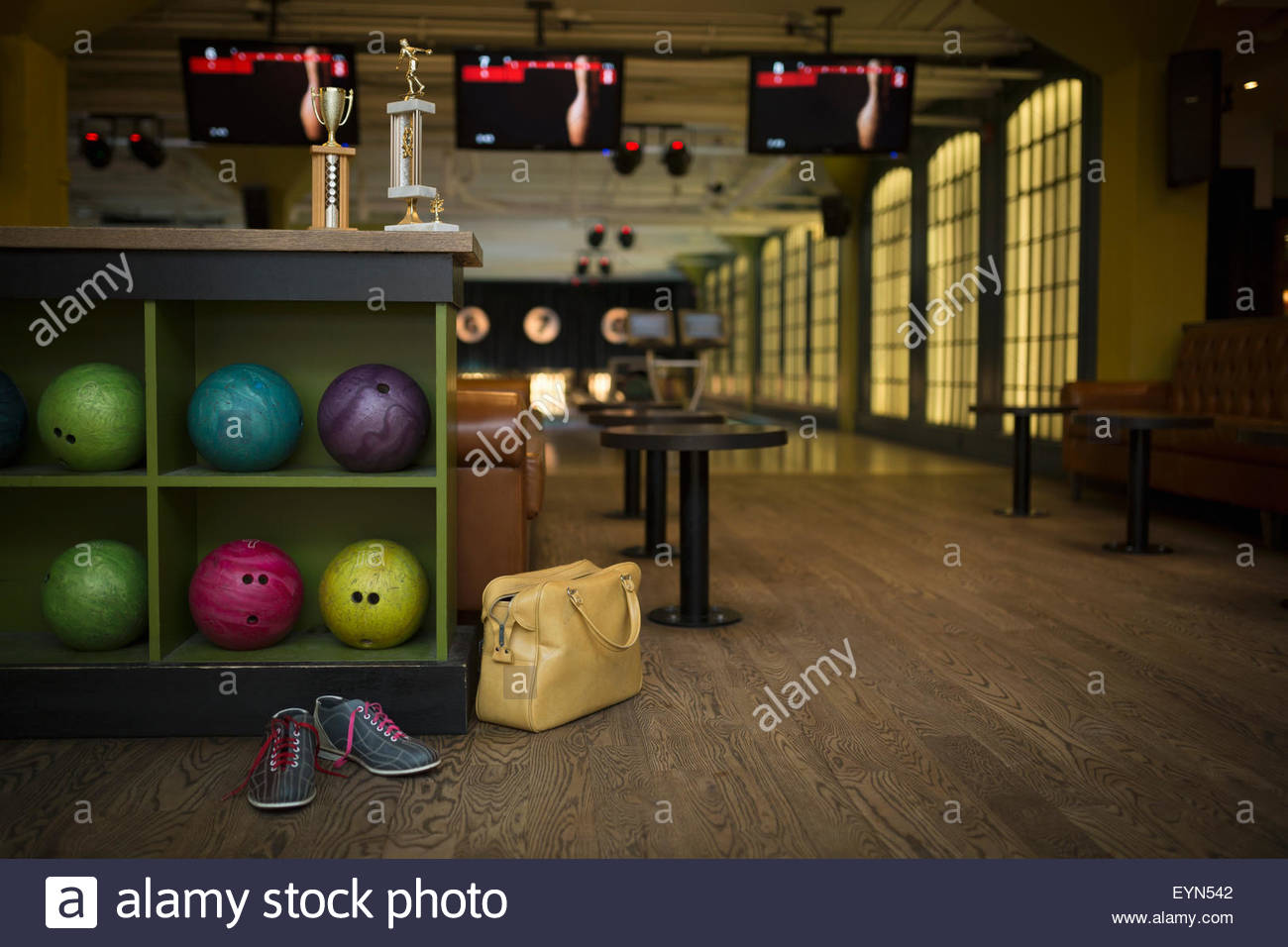 Bowling balls, bag, shoes and trophies bowling alley Stock Photo Alamy