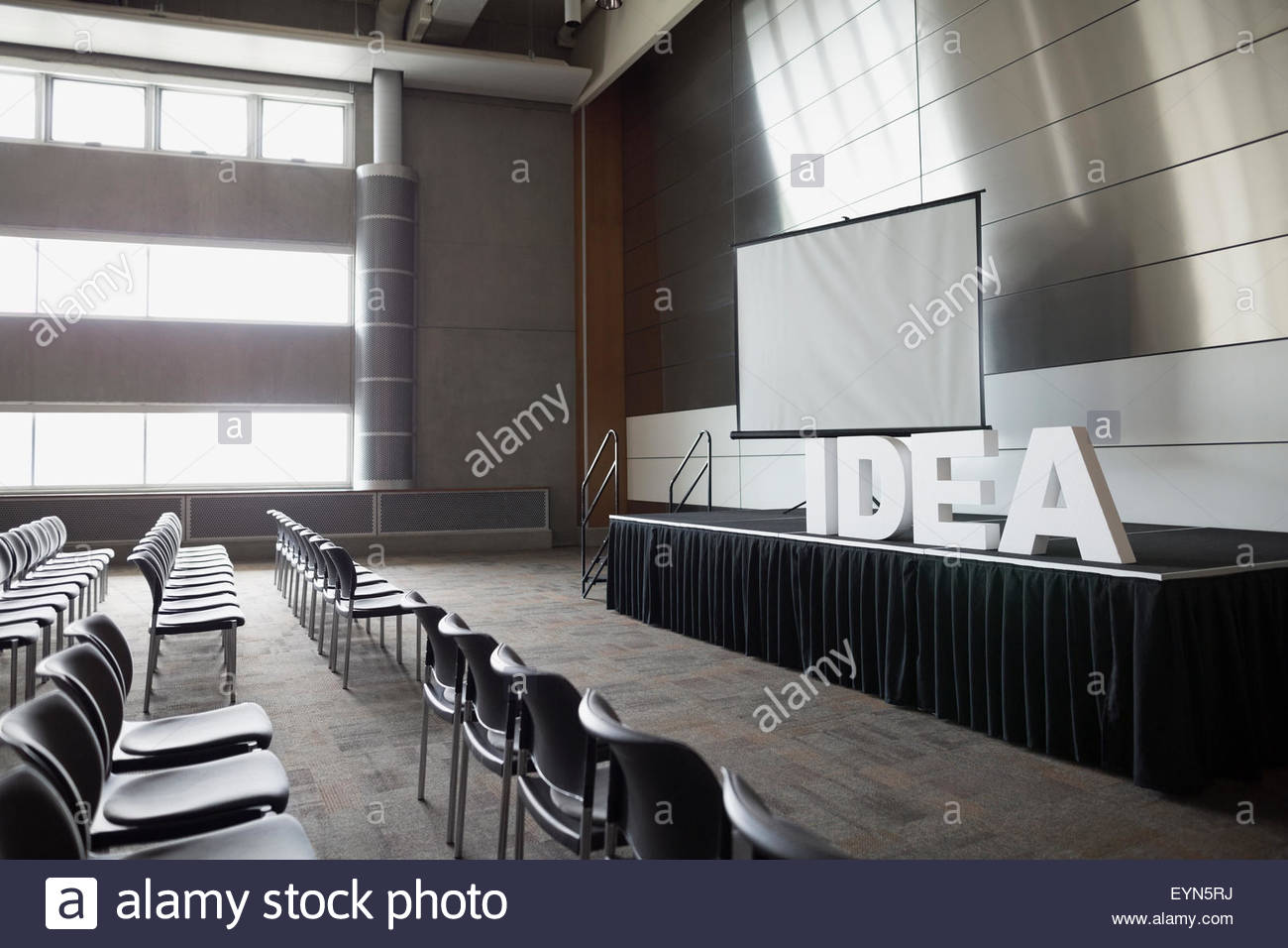 Empty auditorium with Idea letters on stage Stock Photo - Alamy