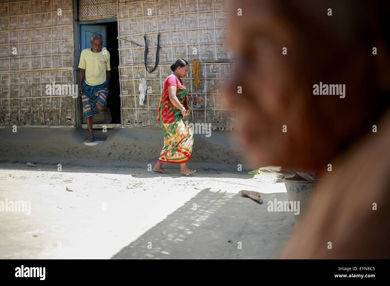 Bangladesh. 30th July, 2015. Shufola Rani Barman, 28, and her family will move to India soon as they determine to leave their land and move to India, at Dalaha-Khagrabari enclaves in the Bangladeshi district of Panchagarh, on July 30, 2015. Bangladesh and India will this week finally swap tiny islands of land, ending one of the world's most difficult border disputes that have kept thousands of people in stateless limbo for almost 70 years. © Suvra Kanti Das/ZUMA Wire/Alamy Live News Stock Photo
