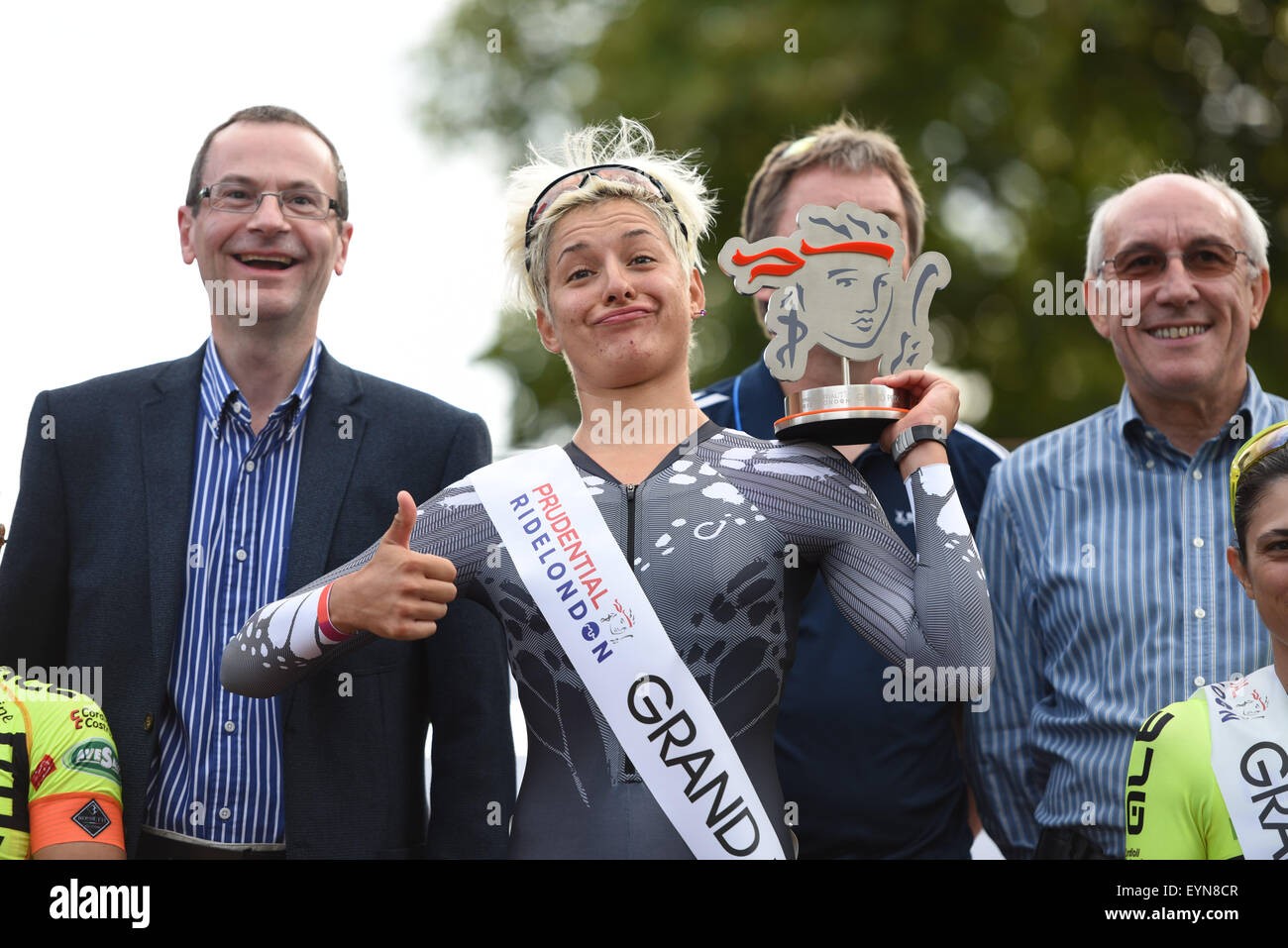 London, UK. 1st August, 2015. Barbara Guarischi (Velocio Sports) is seen on the podium following her win at the Prudential RideLondon Grand Prix at The Mall, London, United Kingdom on 1 August 2015. The race, which started at Horse Guards Parade and finished on The Mall, featured many of the world's top female professional cyclists. Credit:  Andrew Peat/Alamy Live News Stock Photo