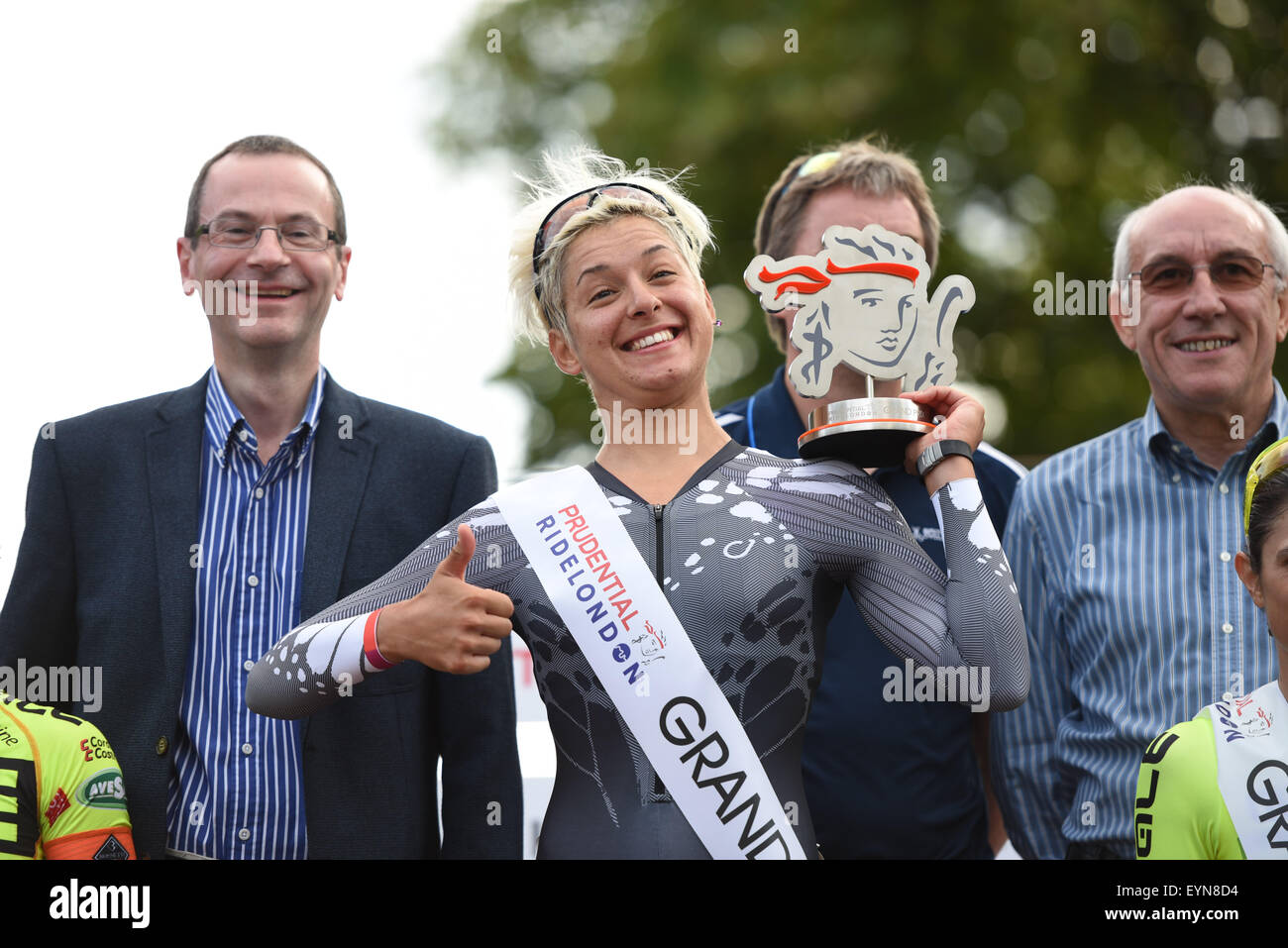 London, UK. 1st August, 2015. Barbara Guarischi (Velocio Sports) is seen on the podium following her win at the Prudential RideLondon Grand Prix at The Mall, London, United Kingdom on 1 August 2015. The race, which started at Horse Guards Parade and finished on The Mall, featured many of the world's top female professional cyclists. Credit:  Andrew Peat/Alamy Live News Stock Photo