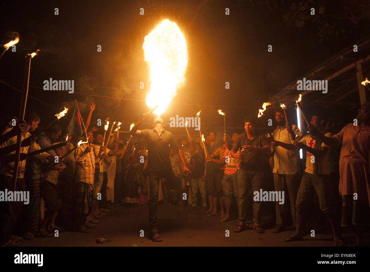 Bangladesh. 1st Aug, 2015. Former Indian enclave residence spits fire as they take part in a procession with torch at Dasiarchhara, Kurigram, Bangladesh, Aug 01, 2015. © Suvra Kanti Das/ZUMA Wire/Alamy Live News Stock Photo