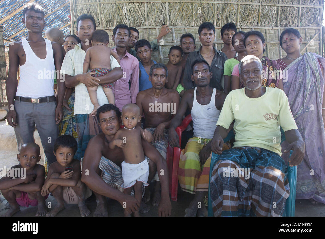 Bangladesh. 30th July, 2015. The residence of Dalaha-Khagrabari poses for group photo, Dalaha-Khagrabari in the Bangladeshi district of Panchagarh, on July 30, 2015. Bangladesh and India will this week finally swap tiny islands of land, ending one of the world's most difficult border disputes that has kept thousands of people in stateless limbo for almost 70 years. © Suvra Kanti Das/ZUMA Wire/Alamy Live News Stock Photo