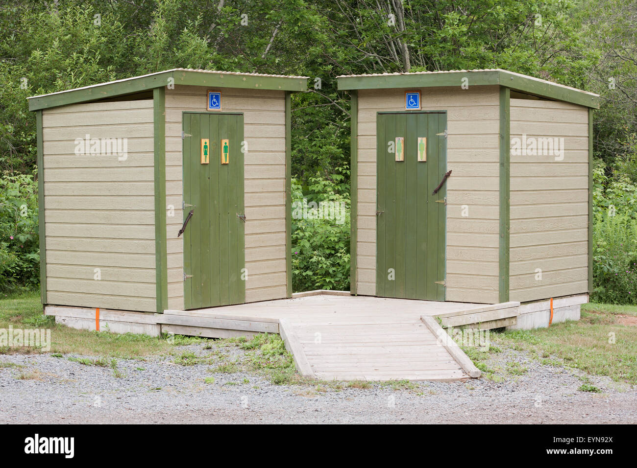 Male and Female outdoor restroom facilities with handicapped accessibility. Stock Photo