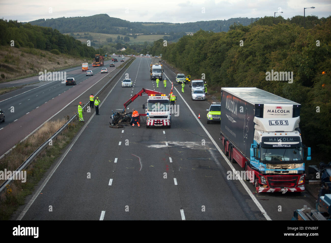 Emergency services attend a traffic accident that completely closed the southbound carriageway of the M5 on Saturday evening as thousands of holiday makers headed towards the South West coastal resorts. The incident occurred alongside Michaelwood Services - Police diverted traffic off the motorway, through the service area to rejoin the M5. Photo: South West Photos, Alamy Live News Stock Photo