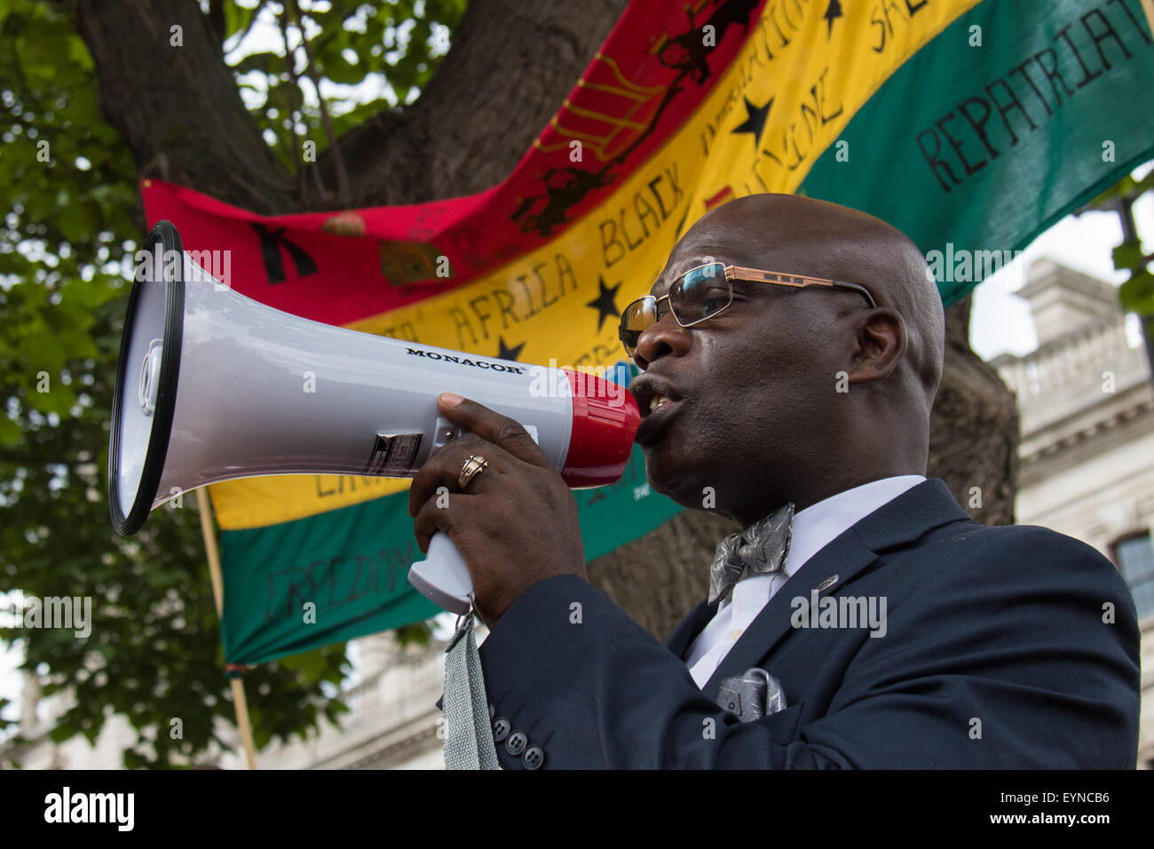 Paliament Square, Westminster, London, August 1st 2015. Thousands of black Londoners, Rastafarians and their supporters arrive at Parliament Square following a march from Brixton, as part of the Rastafari Movement UK Emancipation Day, to demand reparations from the British government for the slave trade. Stock Photo