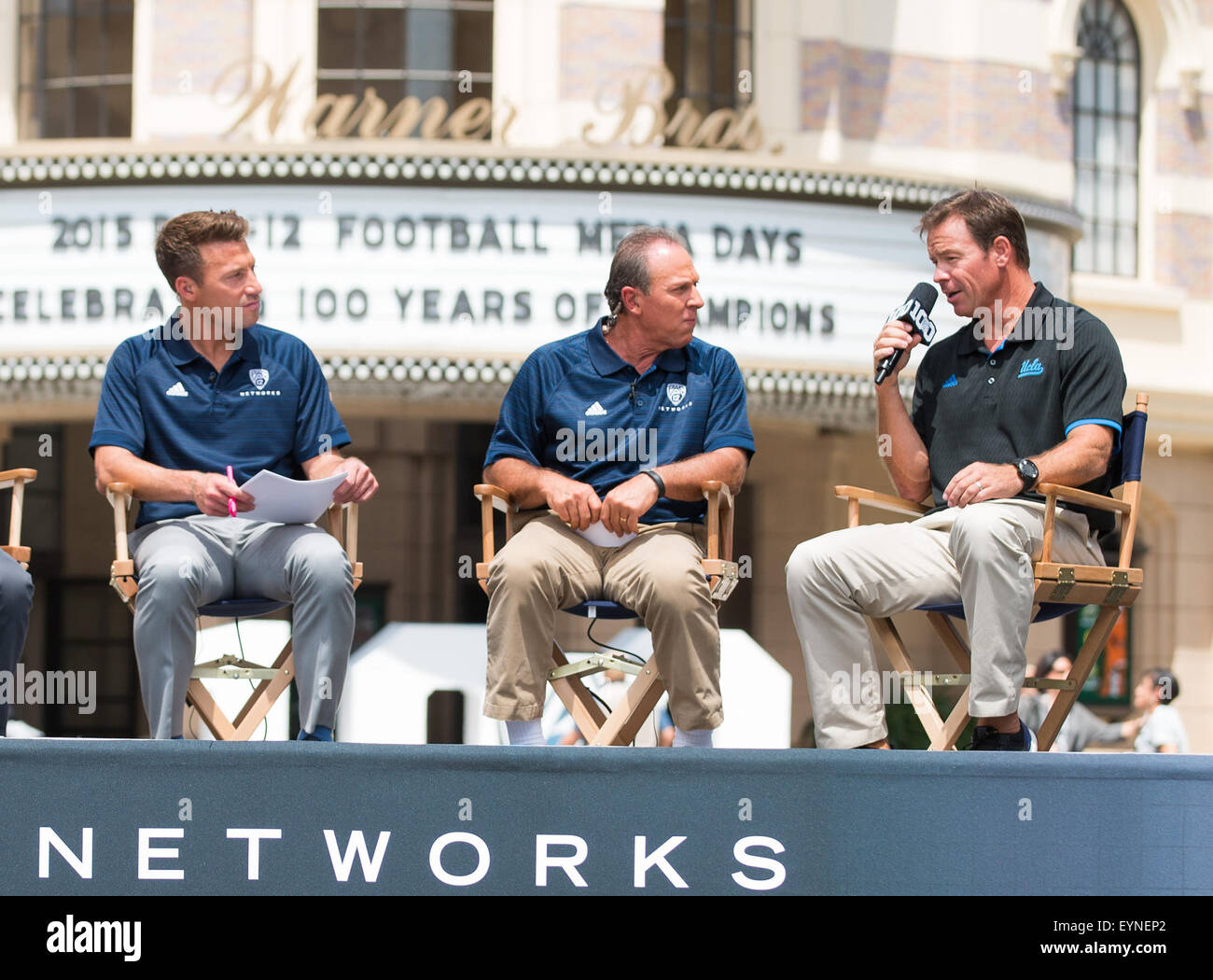 Burbank, CA. 30th July, 2015. UCLA head football coach Jim Mora does an interview with, Yogi Roth and Nick Aliotti during a taping of the Pac-12 networks media day at the Annual PAC-12 Media Day, at the Warner Bros. movie studios, in the City of Burbank, California on July 30, 2015. (Absolute Complete Photographer & Company Credit: Juan Lainez/MarinMedia.org/Cal Sport Media (Network Television please contact your Sales Representative for Television usage. © csm/Alamy Live News Stock Photo