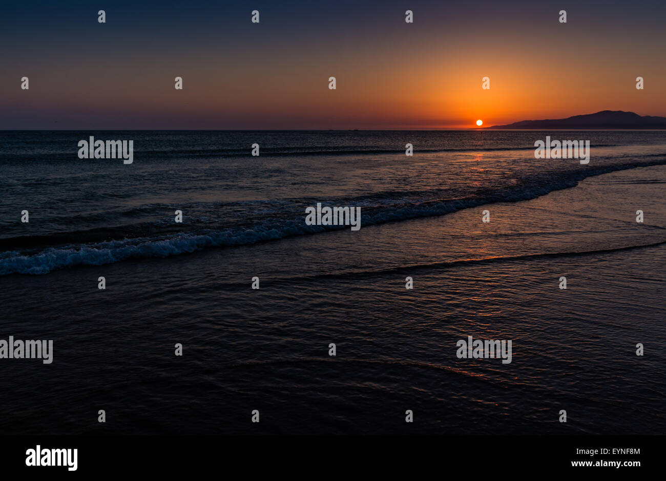 Sunset over the ocean, Tarifa, Spain Stock Photo