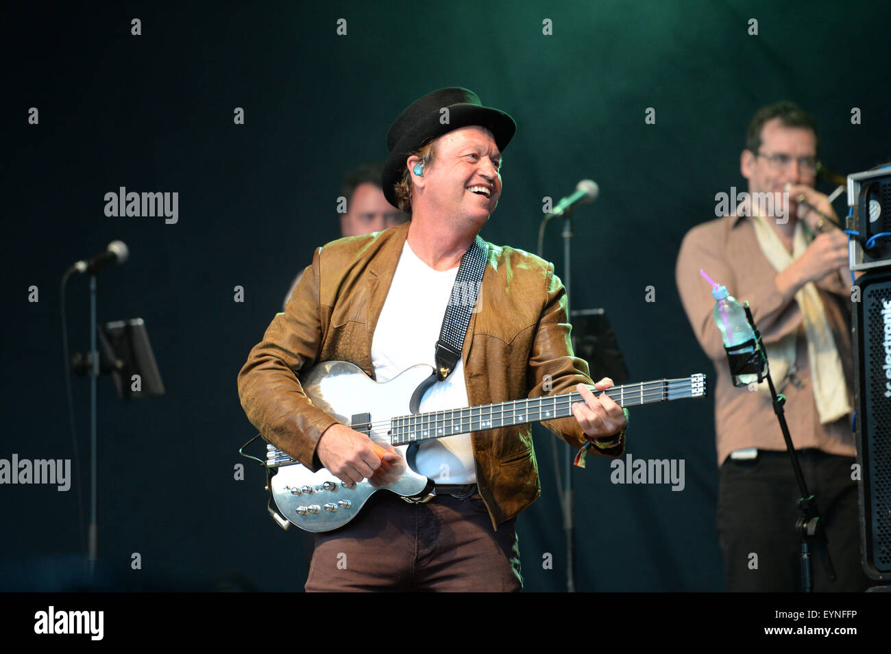 Level 42 with lead singer Mark King on stage at Camp Bestival, Lulworth