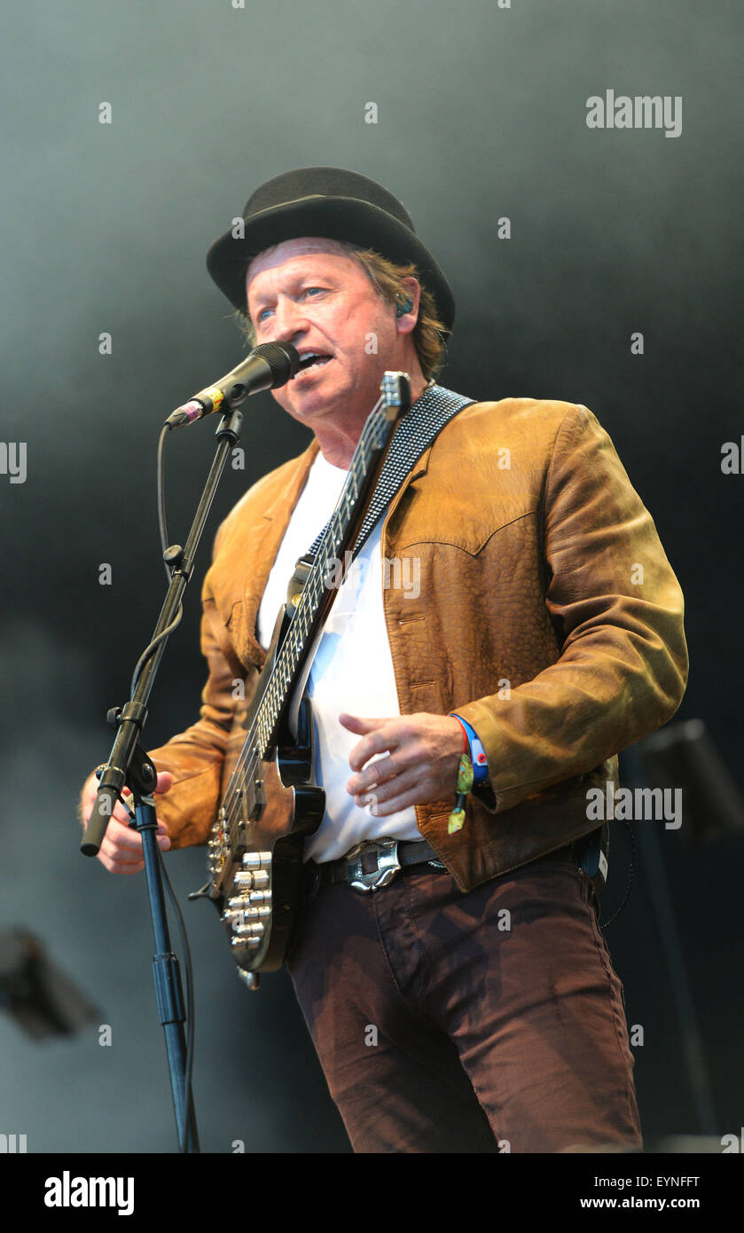 Level 42 with lead singer Mark King on stage at Camp Bestival, Lulworth