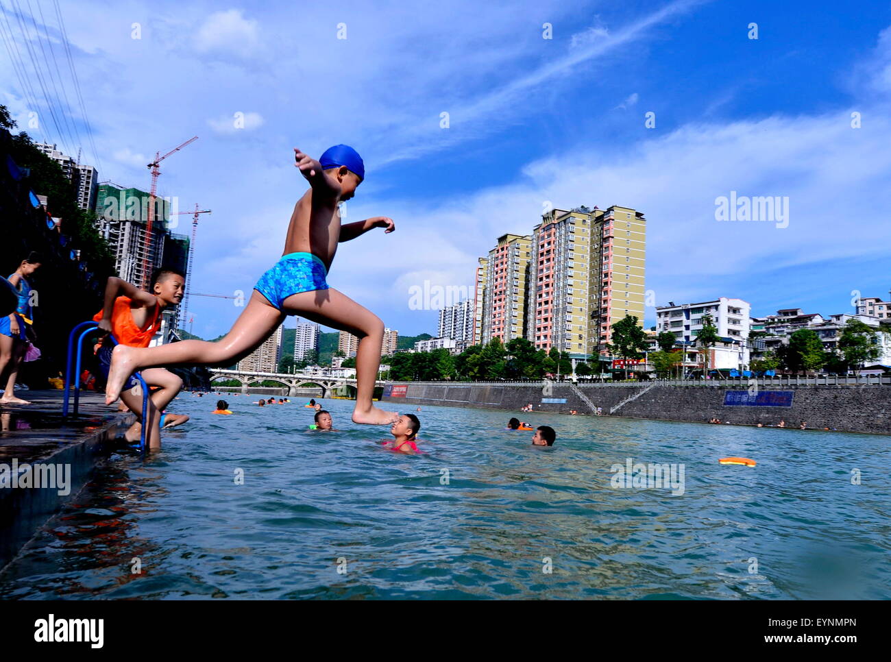 Enshi, China's Hubei Province. 1st Aug, 2015. Children jump into the Gongshui River in Xuan'en County of Enshi Tu and Miao Prefecture, central China's Hubei Province, Aug. 1, 2015. © Song Wen/Xinhua/Alamy Live News Stock Photo