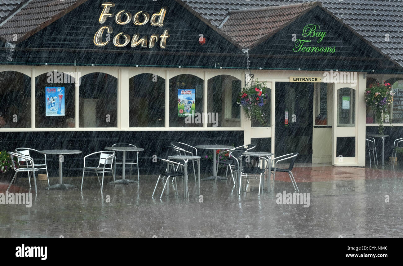 Heavy rain outside restaurant Stock Photo Alamy