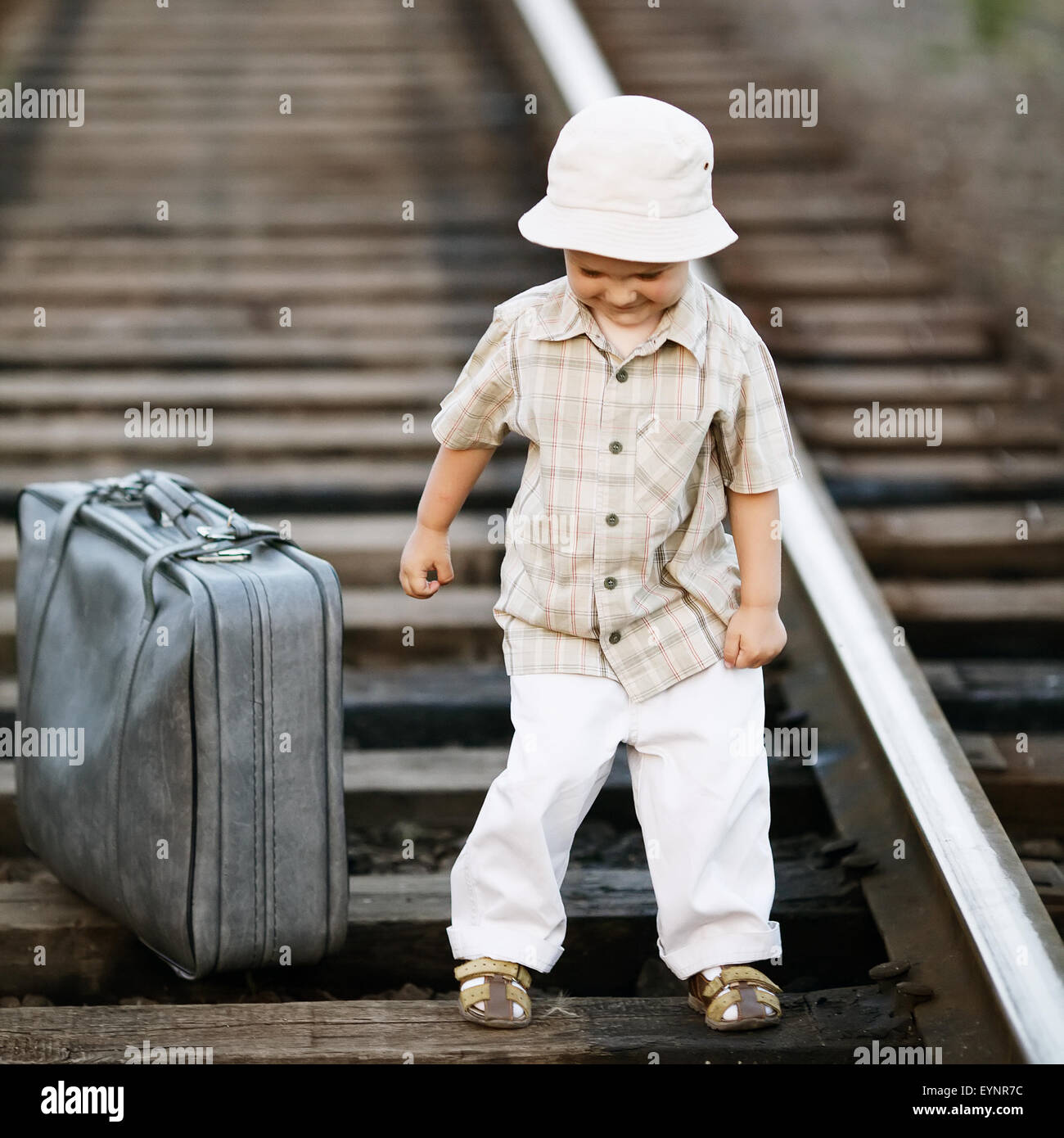 Sad boy suitcase hires stock photography and images Alamy