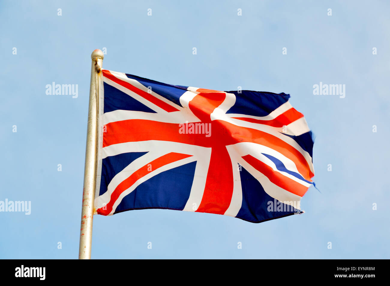 waving flag in the blue sky british colour and wave Stock Photo