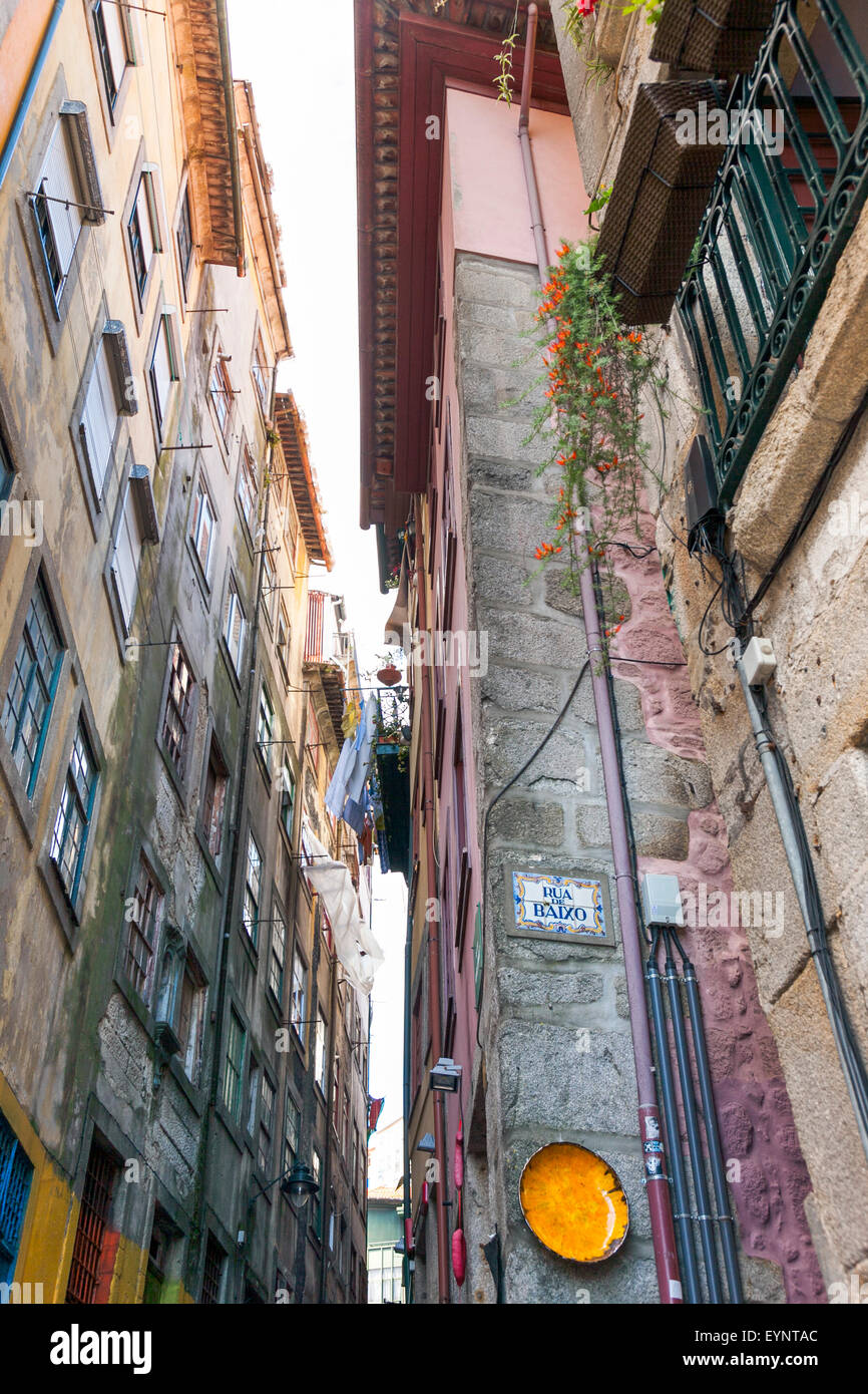 Narrow street in Porto, Portugal (Rua de Baixo) Stock Photo