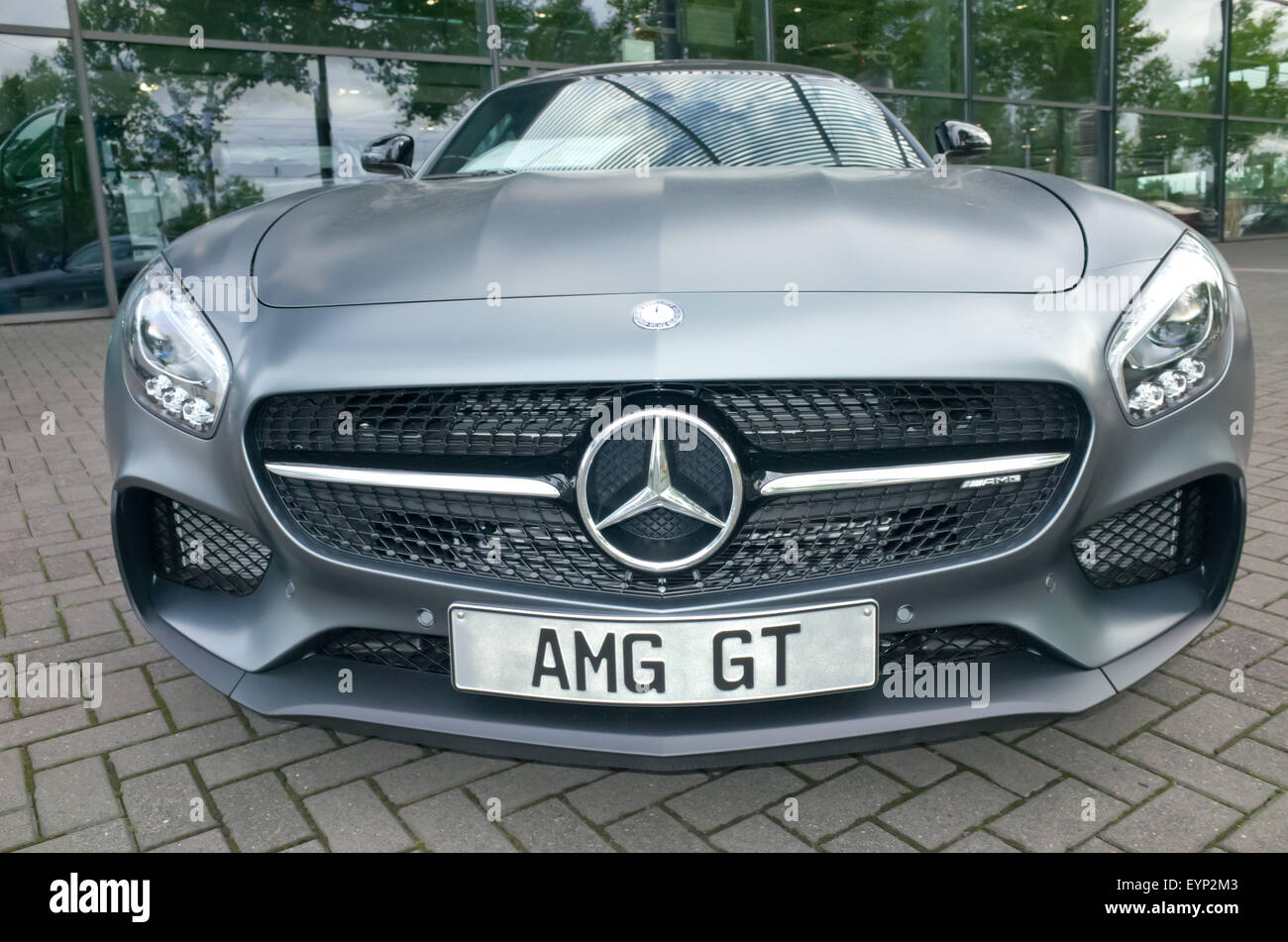 Mercedes AMG GT sat on a showroom forecourt in Germany Stock Photo