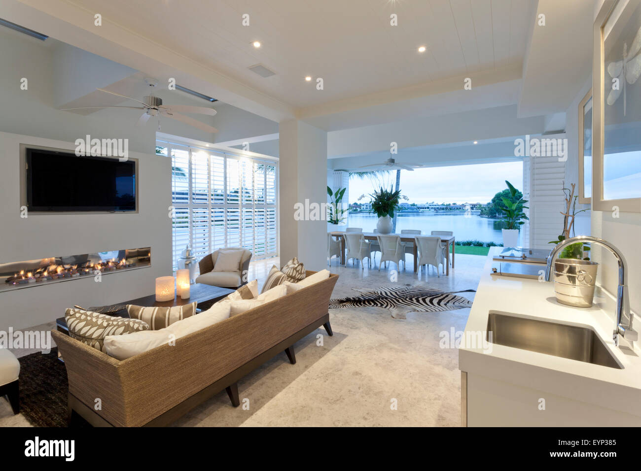 Charming Living Room With A Tv Set And A Spectacular View To