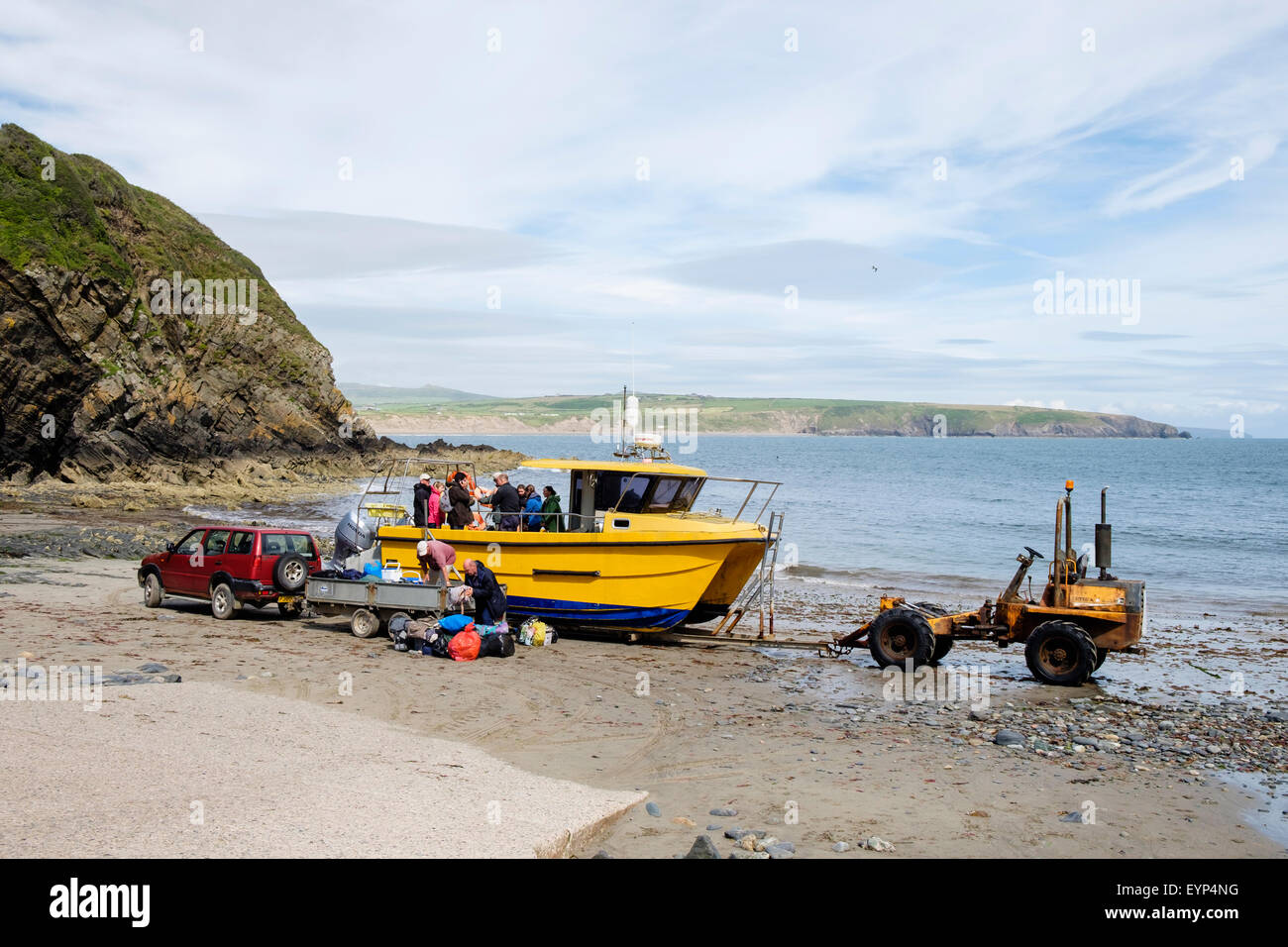 Tourists boarding Bardsey Island or Ynys Enlli ferry boat. Porth Meudwy Aberdaron Lleyn Peninsula Gwynedd North Wales UK Britain Stock Photo