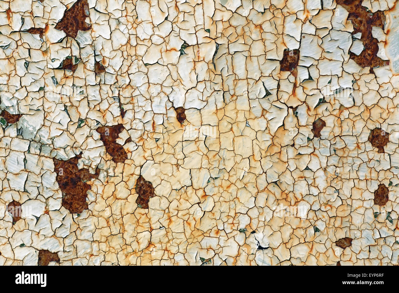 Grunge background with old peeling paint. Texture of rusty metal with cracked paint. Stock Photo