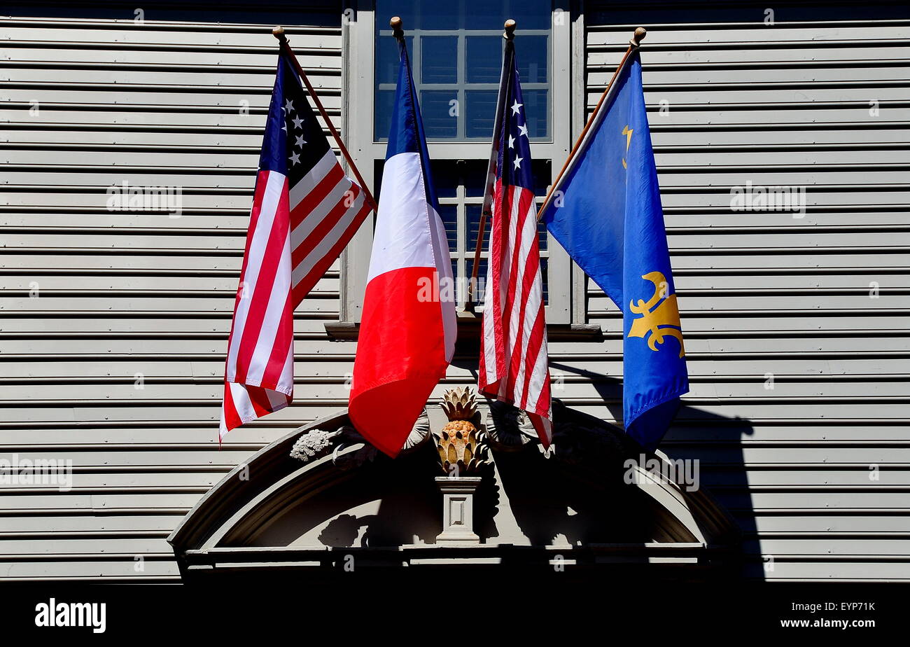 Newport, RI American, French, and Canadian flags fly above doorway