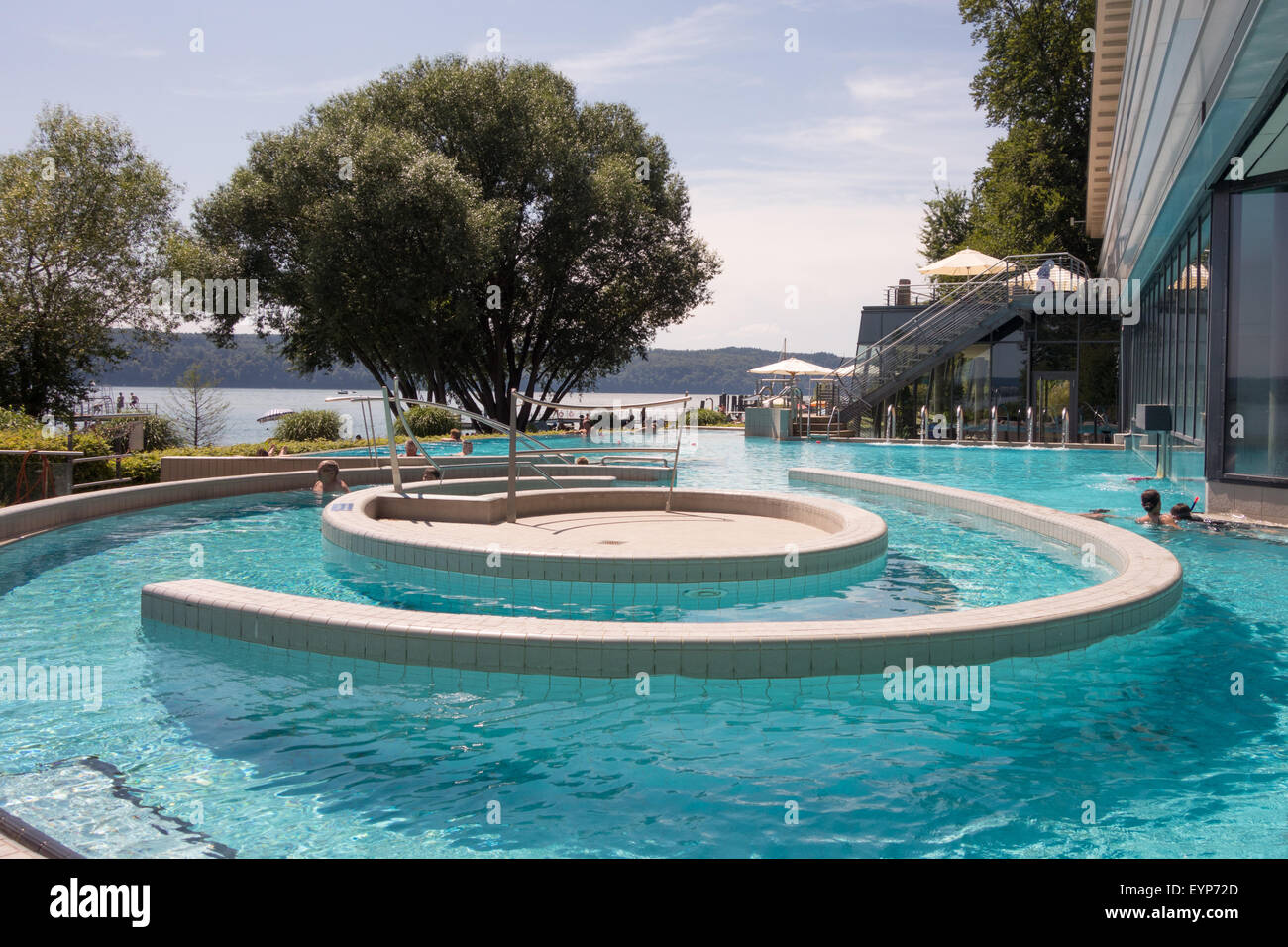 hot springs at Bodensee-Therme, Uberlingen, Germany, with the beach and Lake Constance beyond Stock Photo