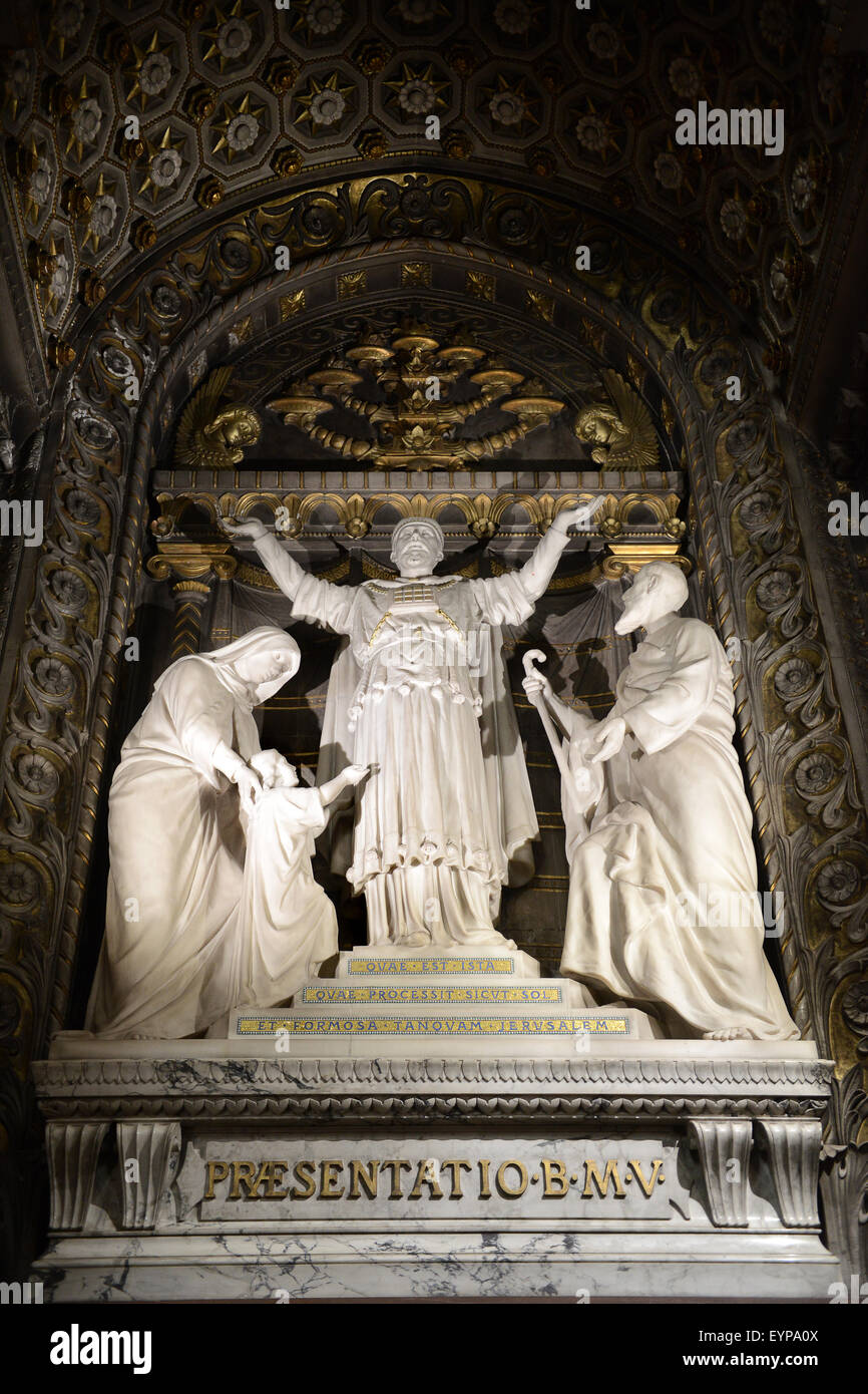 Religious sculpture carving in Lyon Cathedral church France Basilica of Notre-Dame de Fourviere Stock Photo