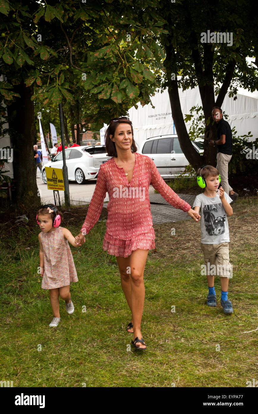 Copenhagen, Denmark. 02nd Aug, 2015. Danish Princess Marie takes a walk with Prince Henrik and Princess Athena at Copenhagen Historic Grand Prix, where her husband, Prince Joachim participated as race driver together with Le Mans winner Tom Kristensen. Credit:  OJPHOTOS/Alamy Live News Stock Photo