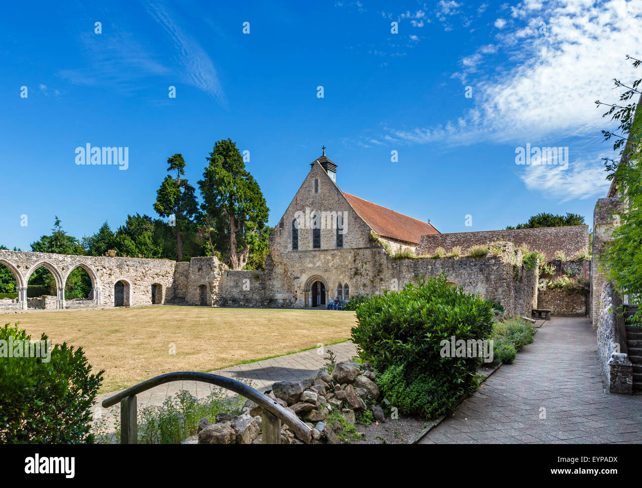 The cloister and refectory (now the parish church), Beaulieu Abbey, Beaulieu, Hampshire, England UK Stock Photo