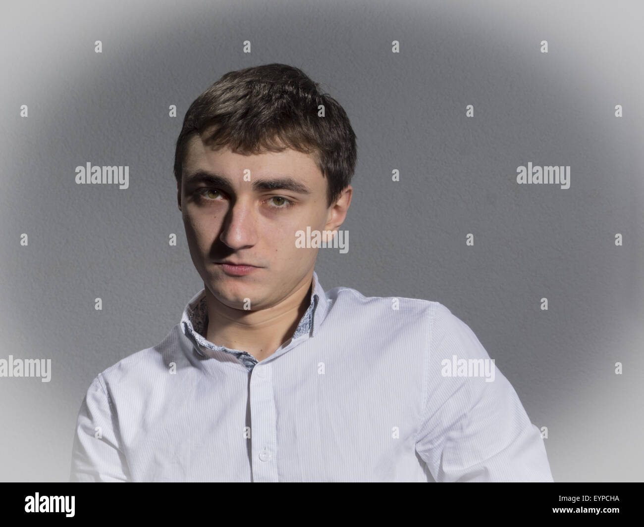 Young Man In A Light Shirt With Open Collar. 19th Feb, 2014. joyless © Igor Golovniov/ZUMA Wire/Alamy Live News Stock Photo
