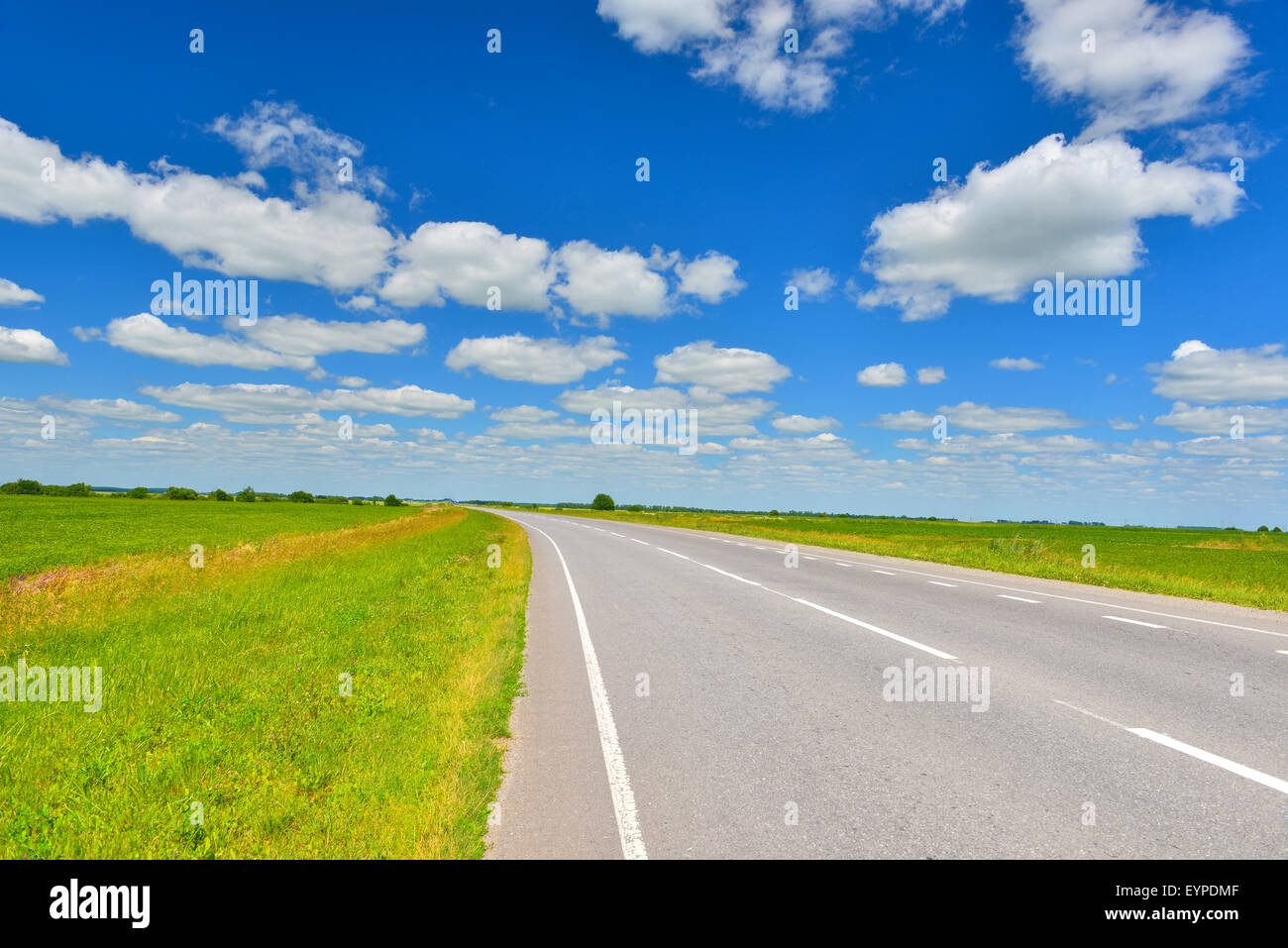 Road in summer countryside Stock Photo