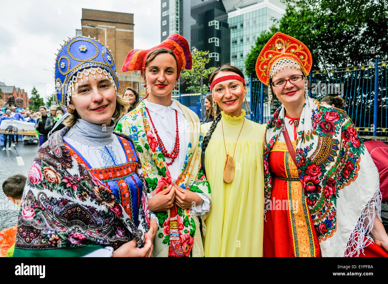Belfast, Northern Ireland. 2 Aug 2015 - Women wear Russian traditional colourful costumes during the Feile an Phobail parade Credit:  Stephen Barnes/Alamy Live News Stock Photo