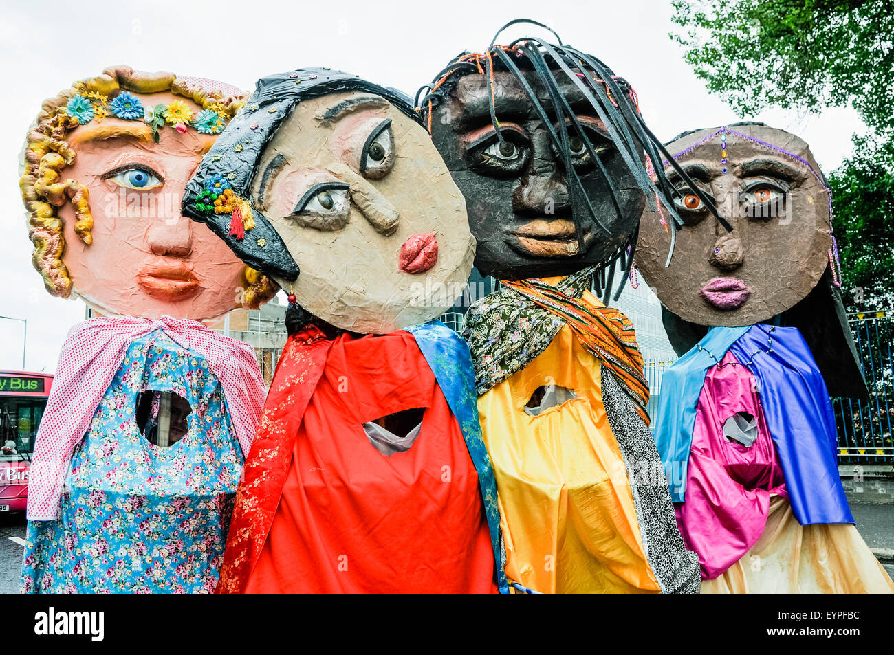 Belfast, Northern Ireland. 2 Aug 2015 - Paper mache giants take part in the Feile an Phobail parade Credit:  Stephen Barnes/Alamy Live News Stock Photo