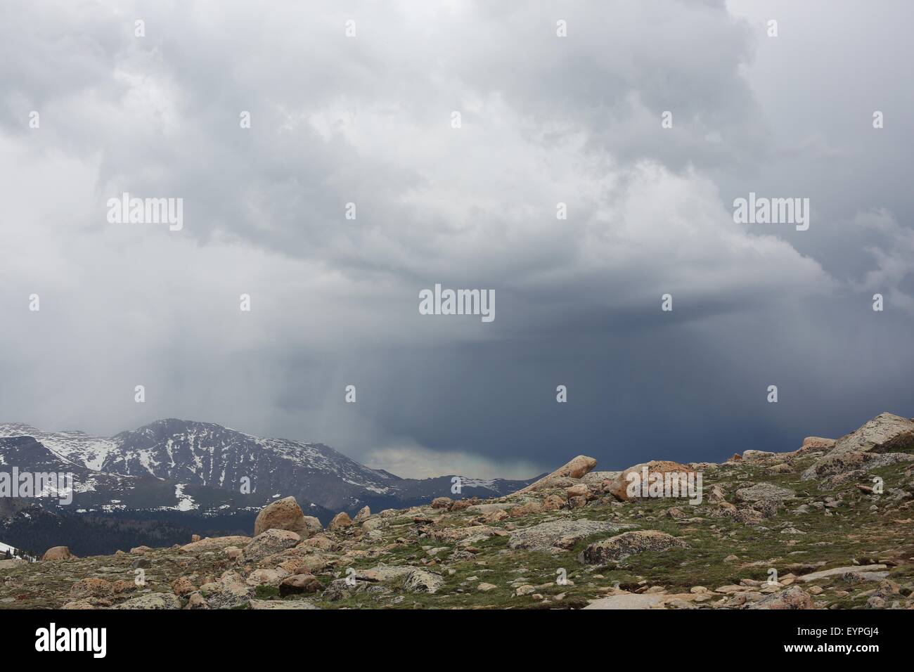 Rain clouds over the mountains at Rocky Mountain National Park Stock Photo