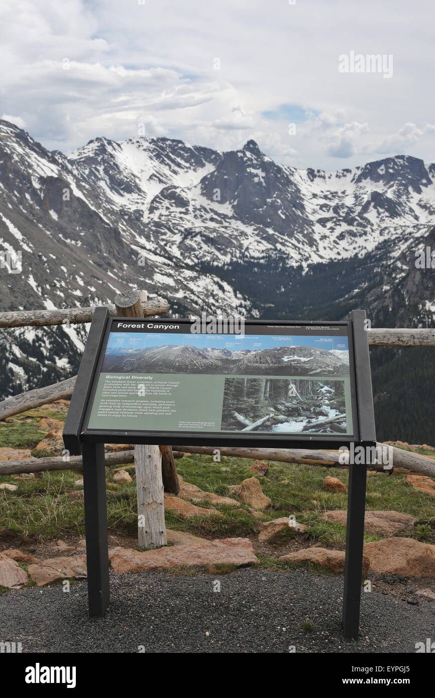 A sign and view of Forest Canyon in Rocky Mountain National Park in Colorado. Stock Photo