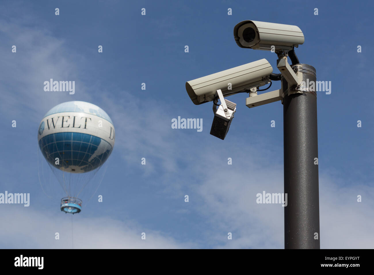 the world under surveillance - security cameras, earth balloon Stock Photo