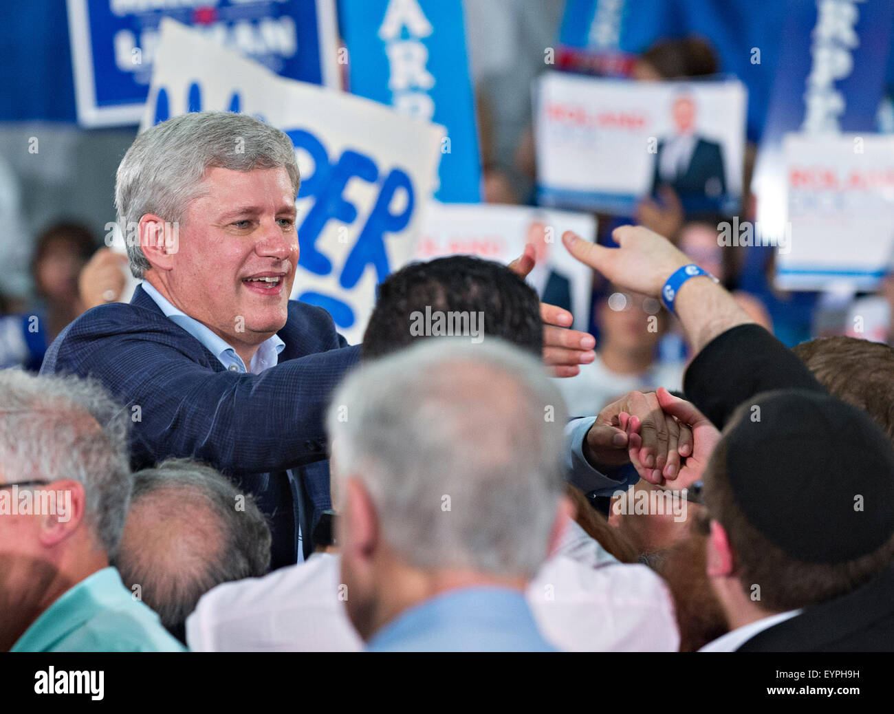 Montreal, Canada. 2nd Aug, 2015. Canadian Prime Minister Stephen Harper greets supporters during a rally in Montreal Aug. 2, 2015. Stephen Harper on Sunday called a parliamentary election for Oct. 19 and kicked off his Conservative party's election campaign. Credit: Andrew Soong/Xinhua/Alamy Live News Stock Photo