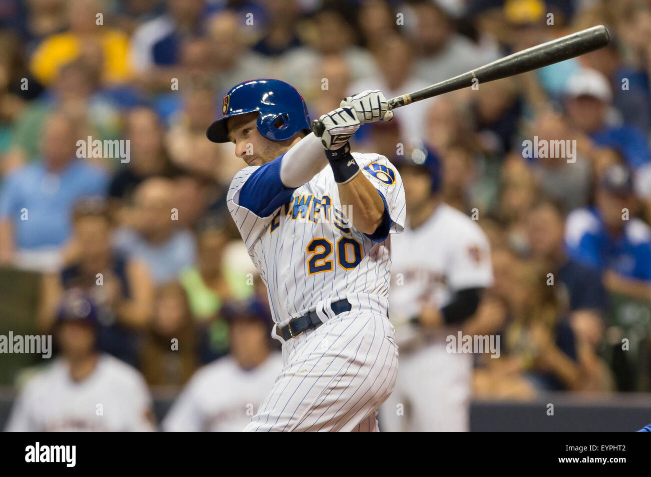 Milwaukee, WI, USA. 31st July, 2015. Milwaukee Brewers catcher Jonathan Lucroy #20 up to bat in the Major League Baseball game between the Milwaukee Brewers and the Chicago Cubs at Miller Park in Milwaukee, WI. John Fisher/CSM/Alamy Live News Stock Photo