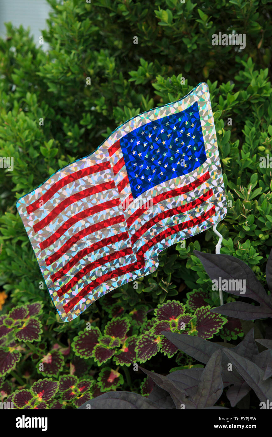 Reflective American flag in a planter Stock Photo - Alamy