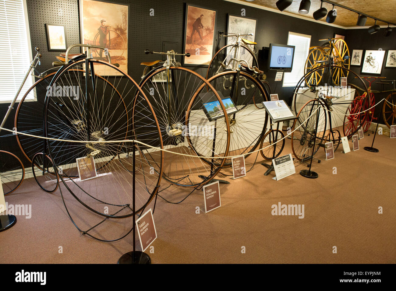 Penny-farthing bicycle (high wheel, high wheeler or ordinary) on display at the Bicycle Museum of America in New Bremen, Ohio. Stock Photo