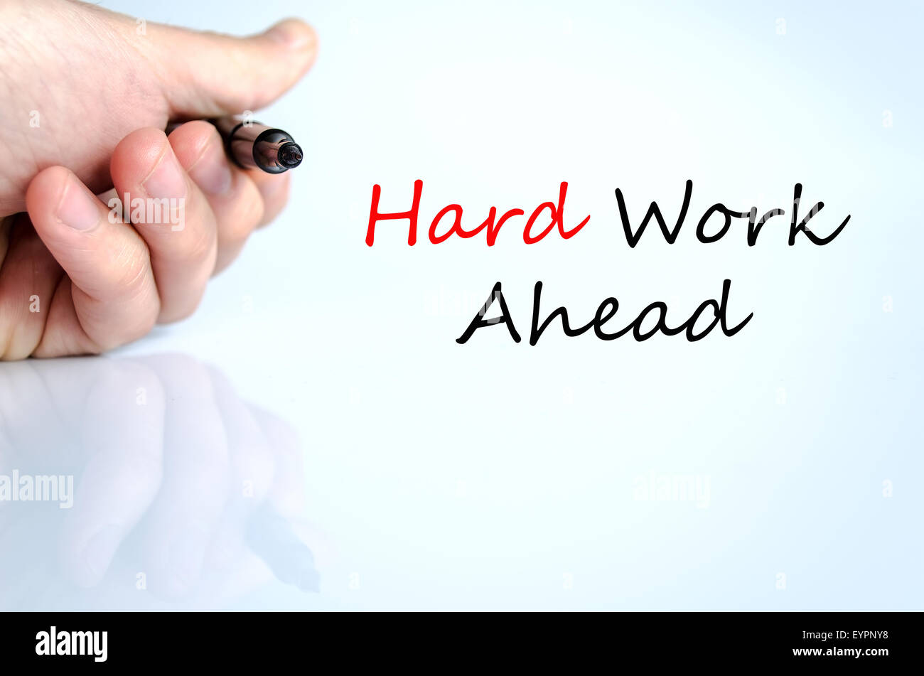Hard work ahead hand concept isolated over white background Stock Photo
