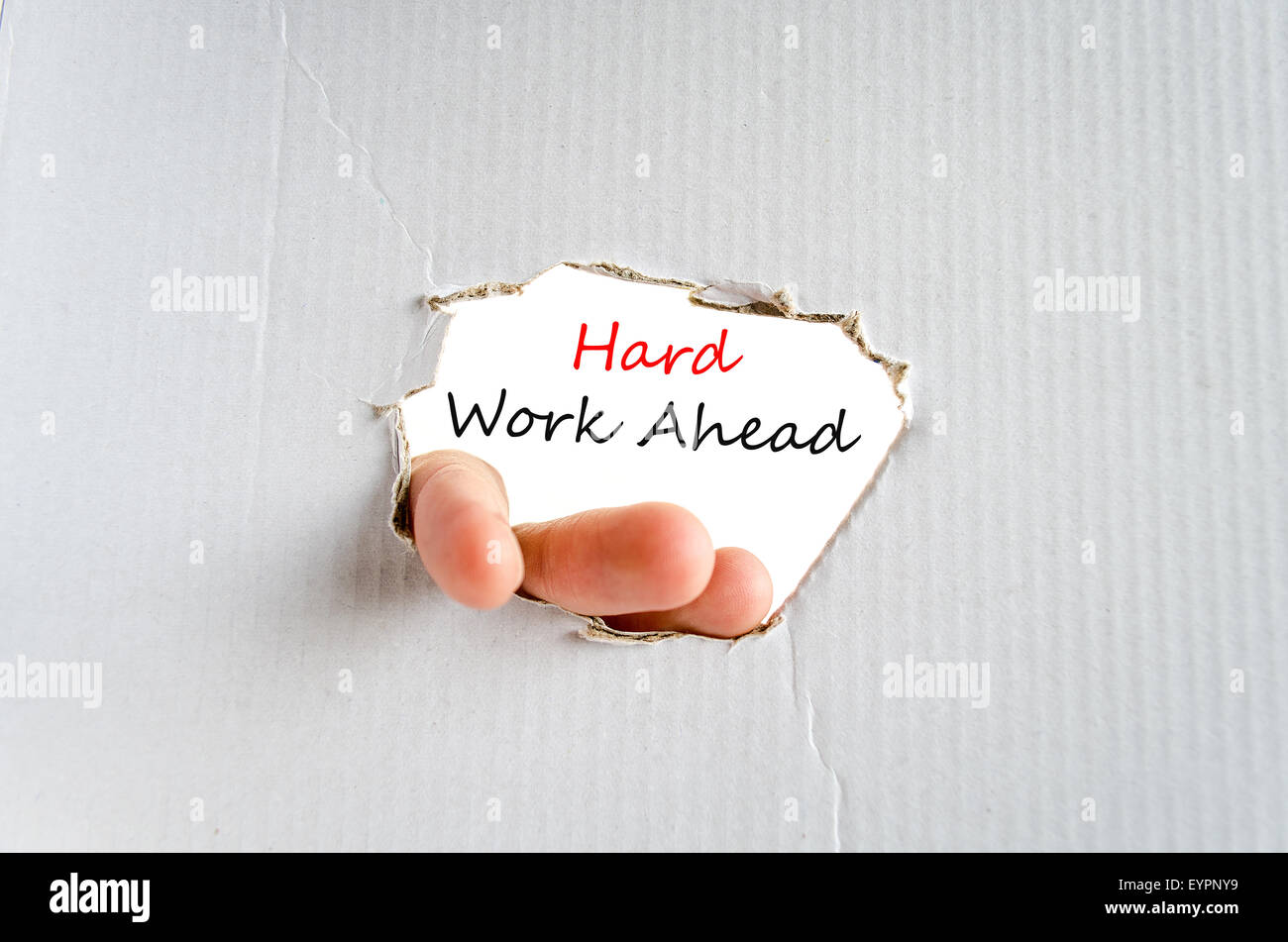 Hard work ahead hand concept isolated over white background Stock Photo