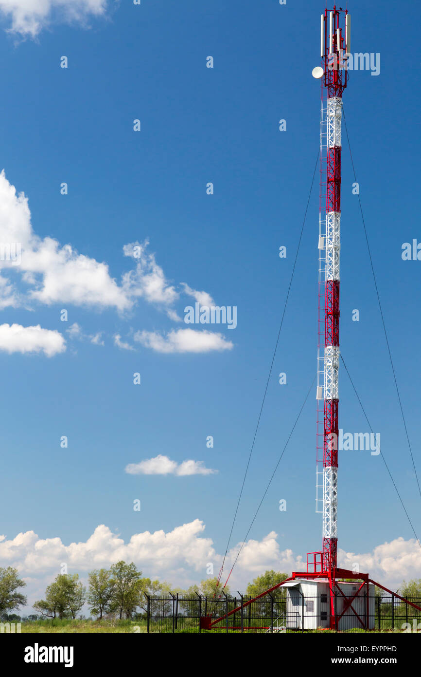 Communication gsm-lte tower in sunny summer day Stock Photo