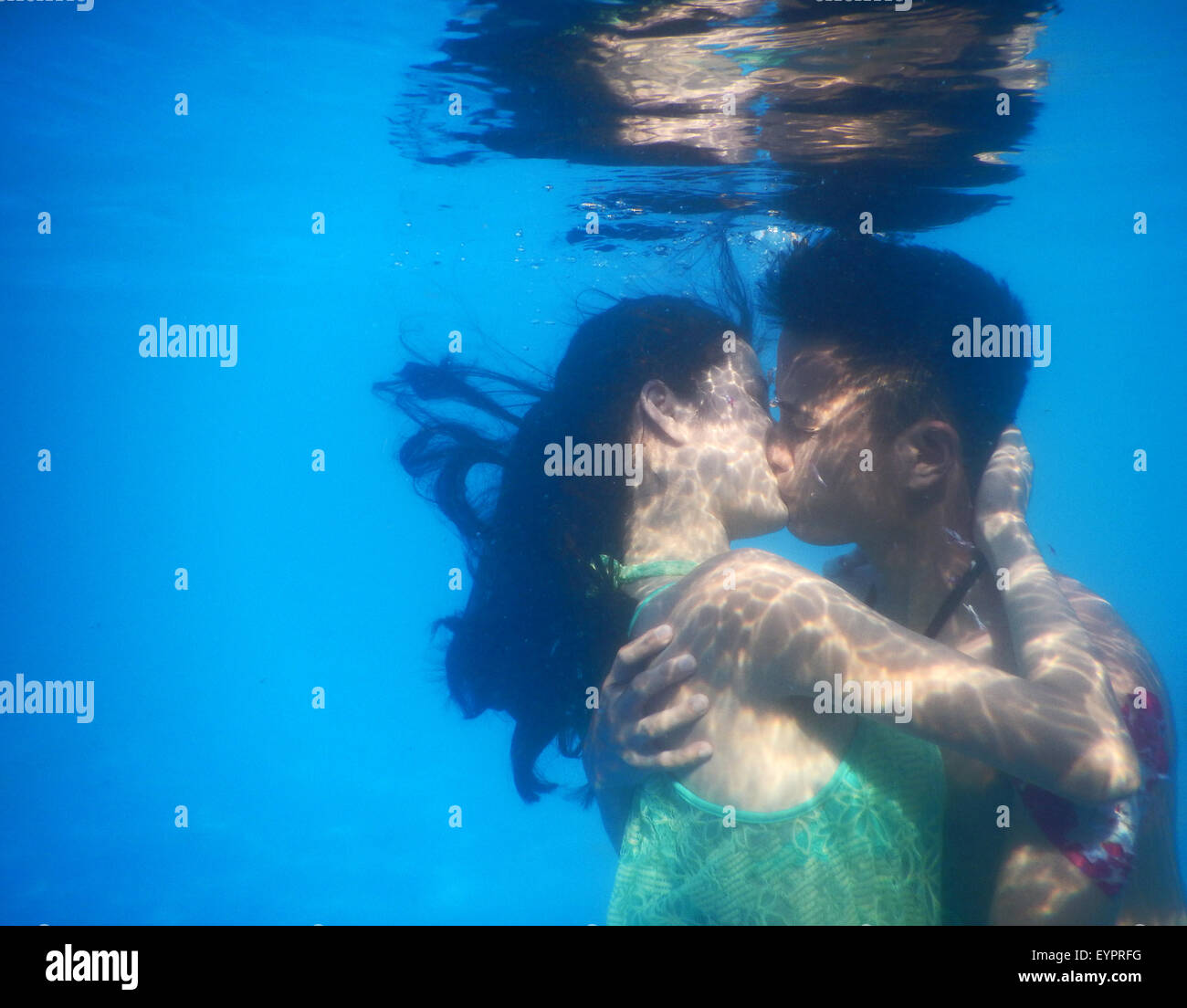 Wuhan, China's Hubei Province. 2nd Aug, 2015. Participants take part in an underwater kissing contest in Wuhan, capital of central China's Hubei Province, Aug. 2, 2015. A total of 11 couples took part in the contest and the winners won by kissing for one minute and two seconds under water. Credit:  Zhong Xue/Xinhua/Alamy Live News Stock Photo